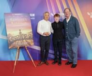 Aaron MacGregor (center) seen at the screening of Kensuke's Kingdom (Image via Getty)